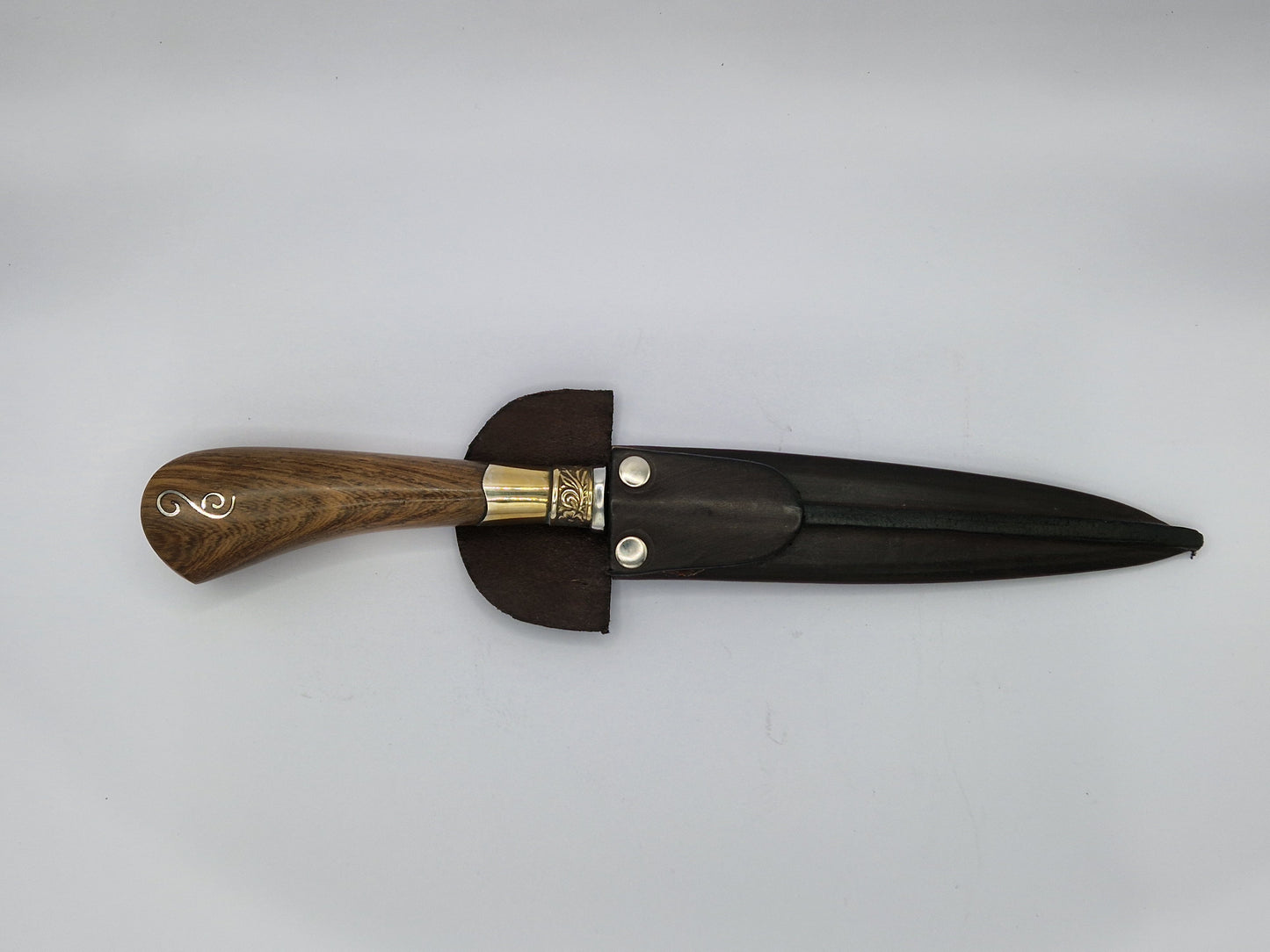 Knife with Alpaca embedded in the wood